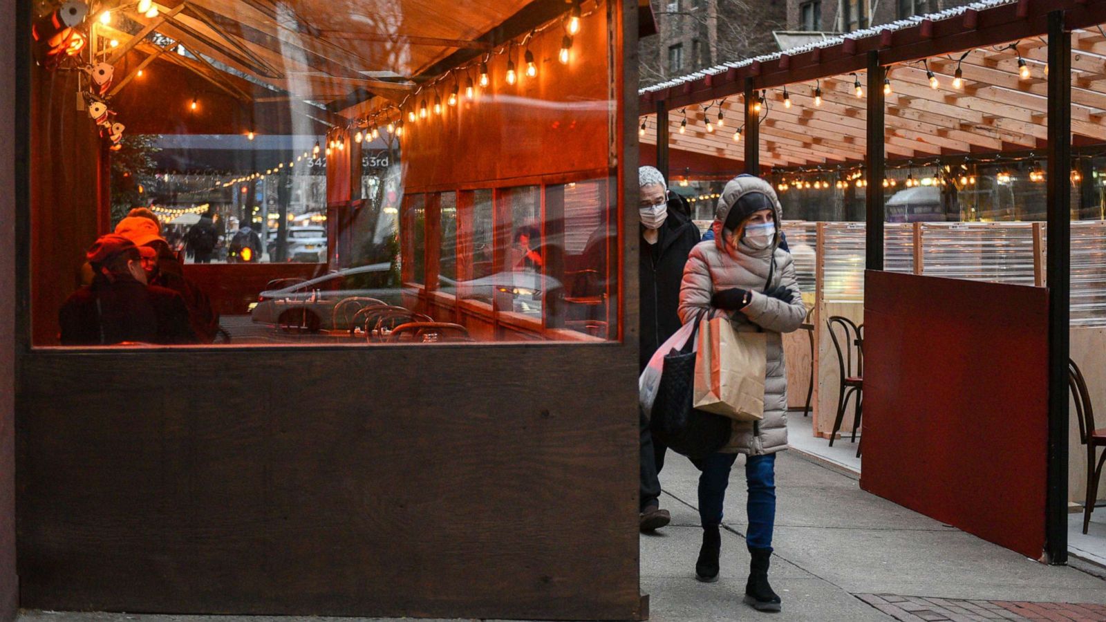 PHOTO: People sit at outdoor dining tables at Parnell's restaurant in midtown Manhattan amid the COVID-19 outbreak in New York, Jan. 27, 2021.