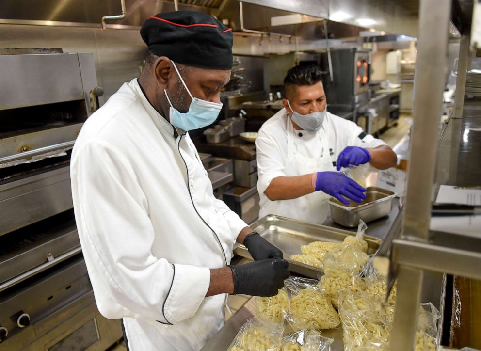 PHOTO: Executive Chef Willie Brockington, left, and line chef Saul Sibri, work in the kitchen at Stokesay Castle in Lower Alsace Township, Pa., August 6, 2020.
