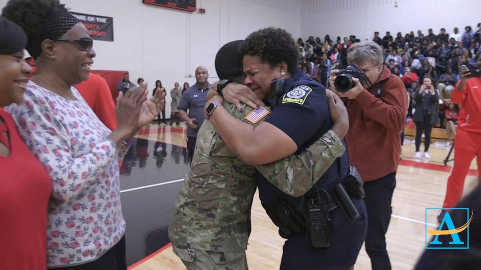 PHOTO: U.S. Army Spc. Shakir Aquil surprised his mom Atlanta Public Schools officer L.J. Williamson at a high school pep rally.