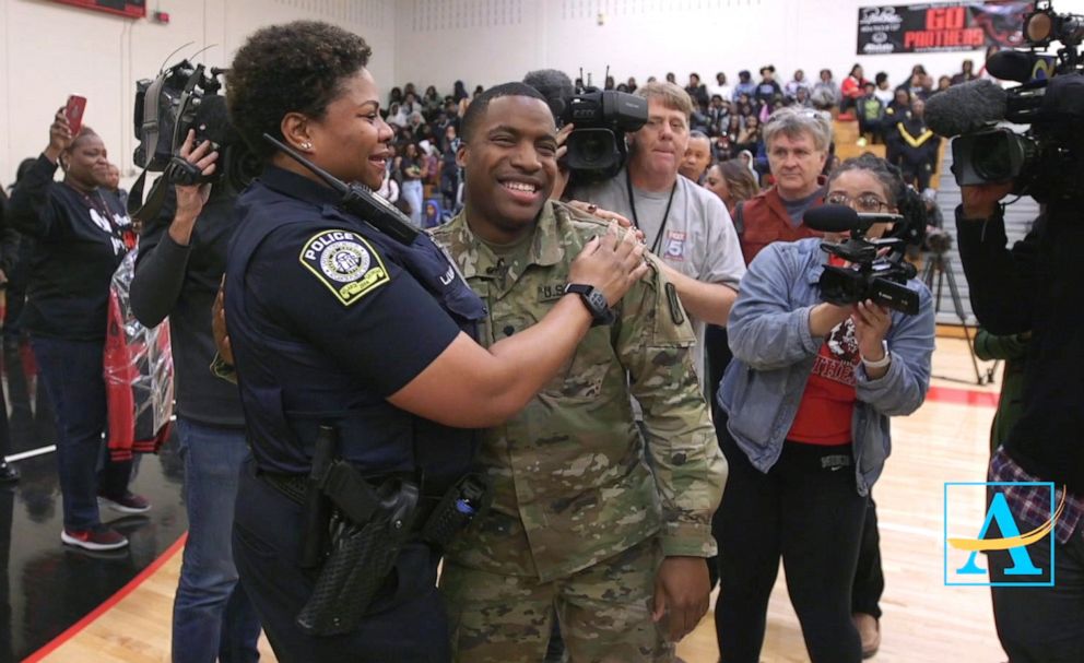 PHOTO: U.S. Army Spc. Shakir Aquil surprised his mom Atlanta Public Schools officer L.J. Williamson at a high school pep rally.