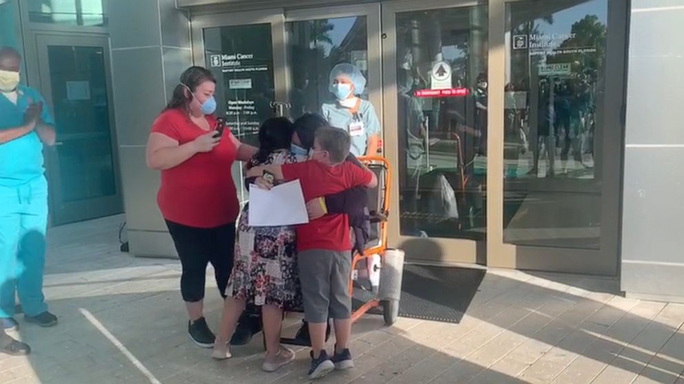 PHOTO:  Ruthie Ramirez was discharged from Miami Cancer Institute, May 1, 2020, after beating COVID-19 and her kids Sofia and Isaac we're waiting to greet her with open arms.
