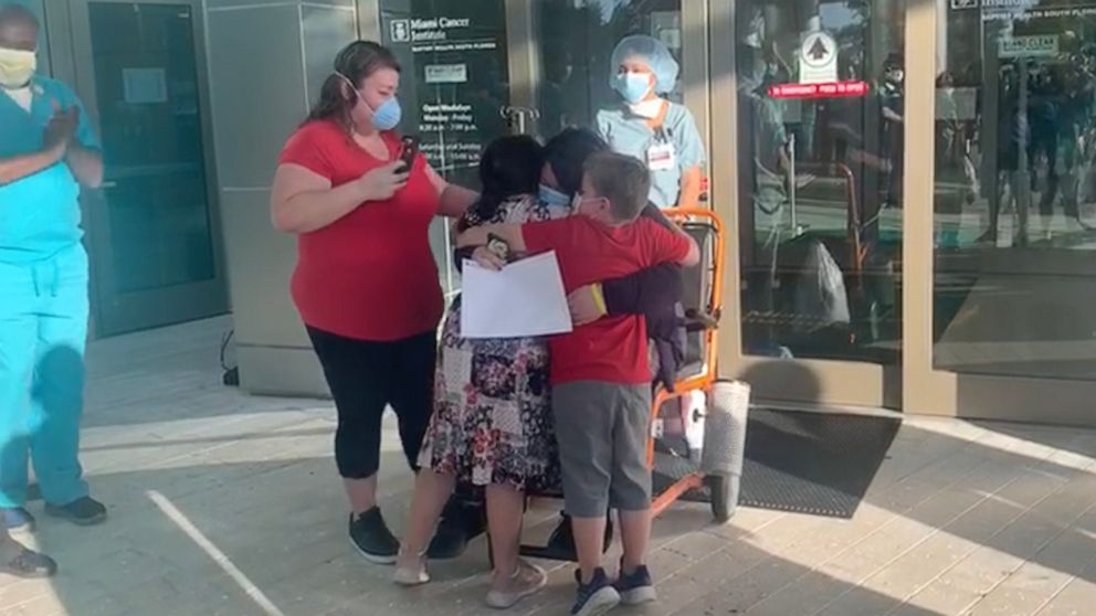 PHOTO:  Ruthie Ramirez was discharged from Miami Cancer Institute, May 1, 2020, after beating COVID-19 and her kids Sofia and Isaac we're waiting to greet her with open arms.
