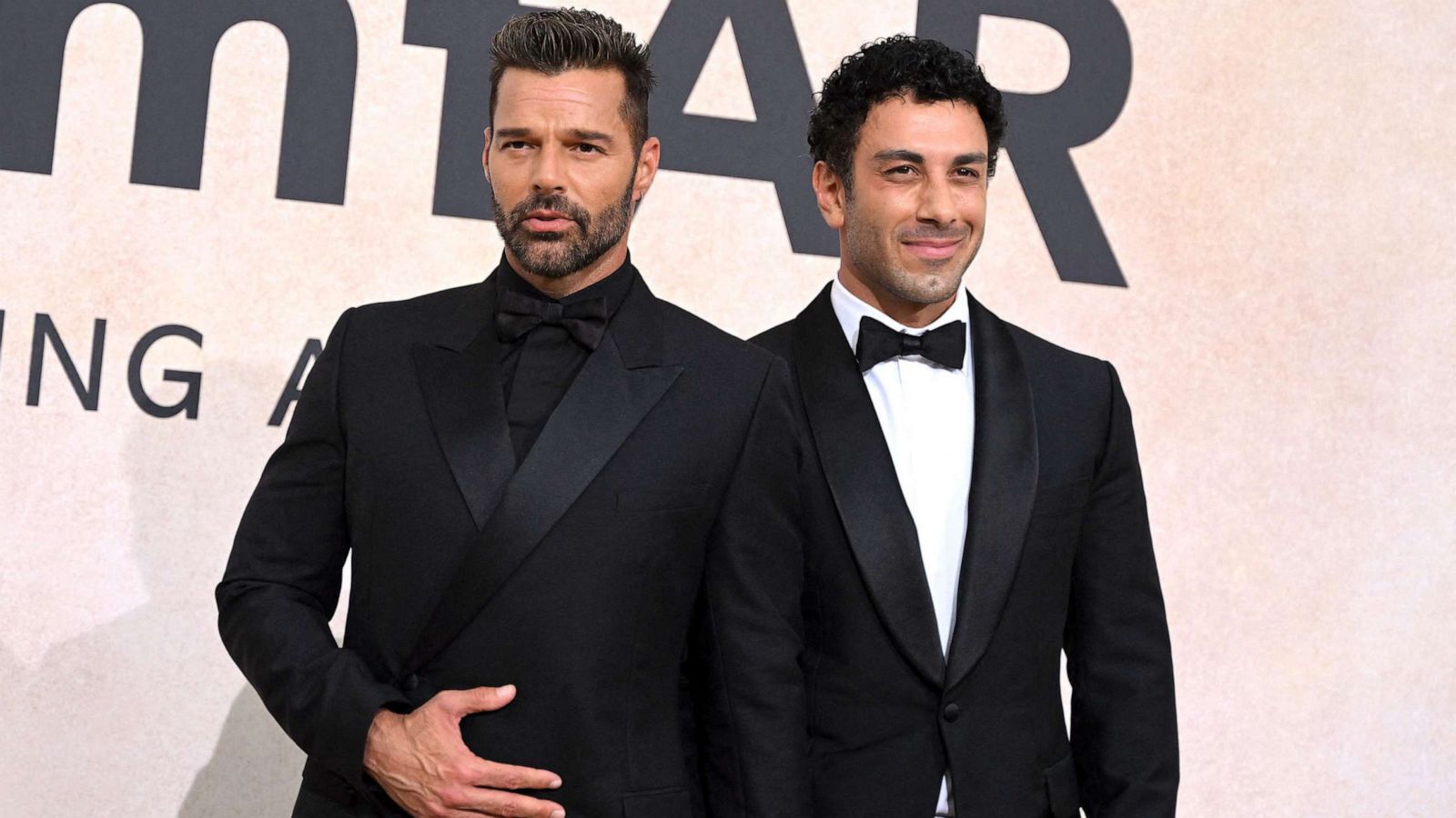 PHOTO: Singer, actor Ricky Martin and painter Jwan Yosef arrive on May 26, 2022 to attend the annual amfAR Cinema Against AIDS Cannes Gala at the Hotel du Cap-Eden-Roc in Cap d'Antibes, southern France.