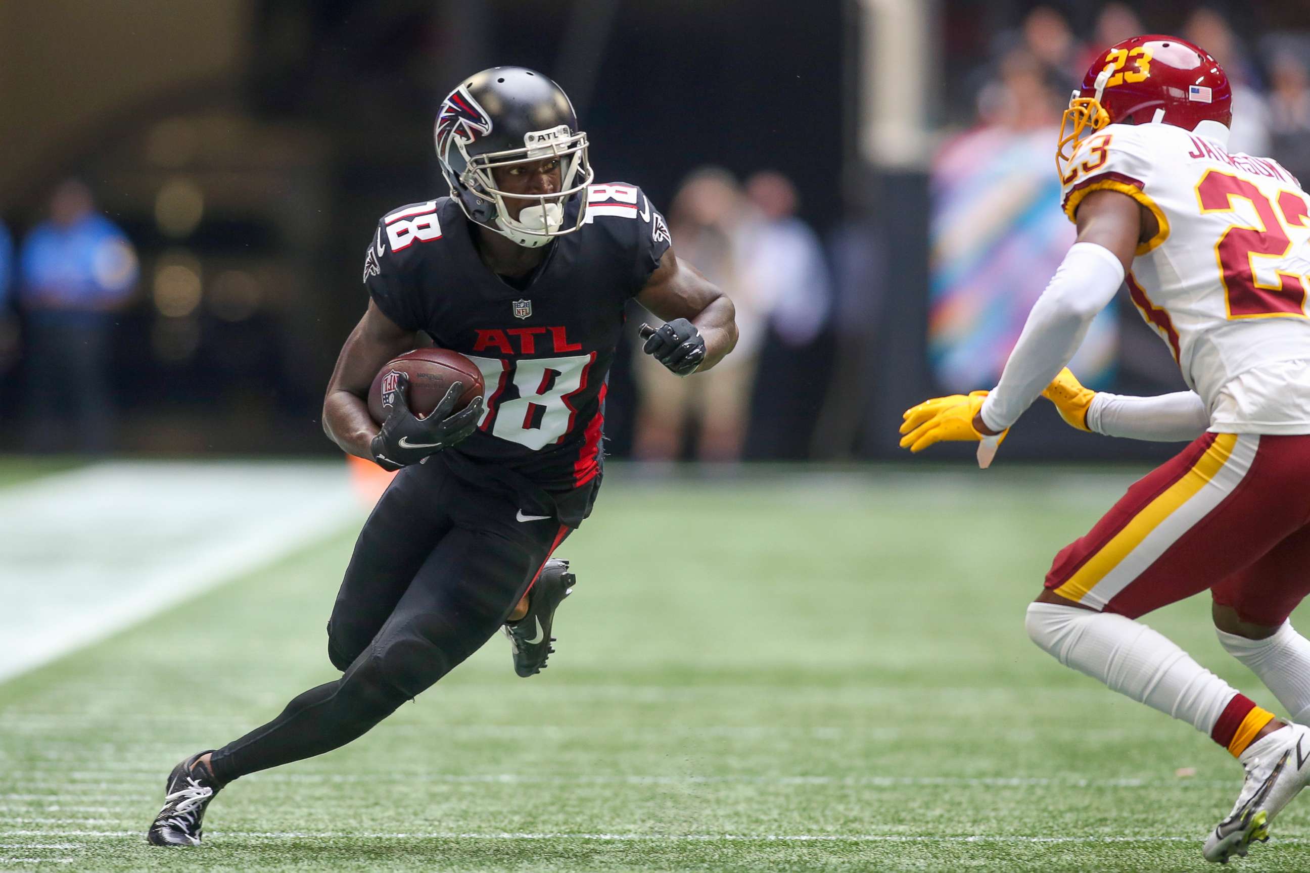 PHOTO: Atlanta Falcons wide receiver Calvin Ridley runs with the ball after a catch against the Washington Football Team, Oct. 3, 2021, in Atlanta.