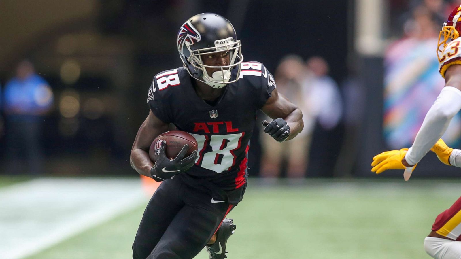 PHOTO: Atlanta Falcons wide receiver Calvin Ridley runs with the ball after a catch against the Washington Football Team, Oct. 3, 2021, in Atlanta.