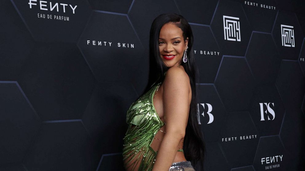 VIDEO: Rihanna steps up her style while showing off baby bump at Paris Fashion Week