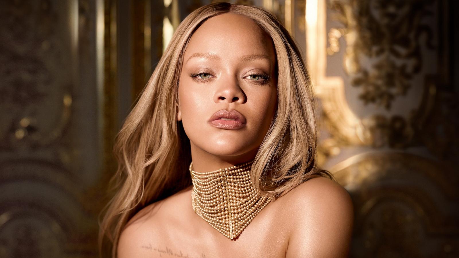 Rihanna glows in gold for new Dior J