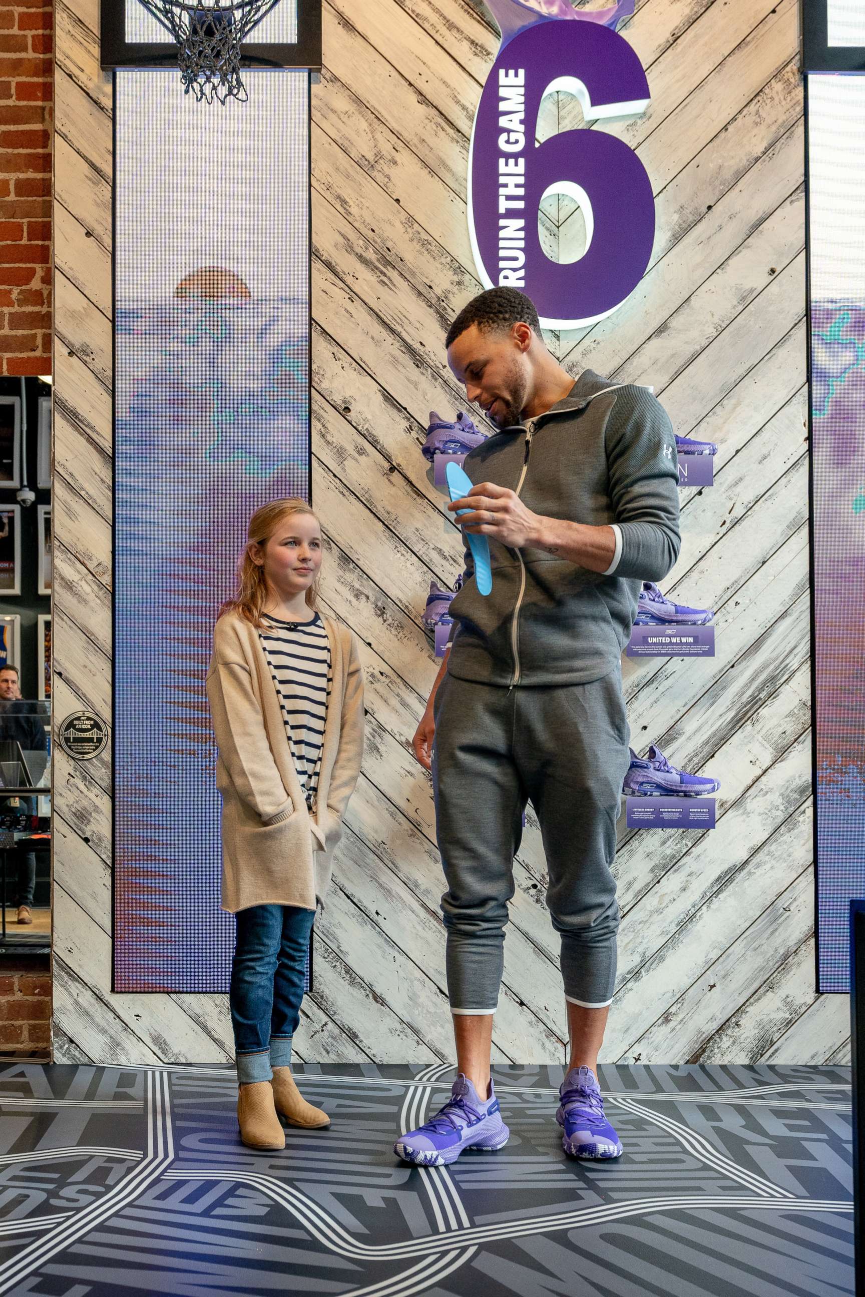 PHOTO: Riley Morrison met her basketball idol Stephen Curry at a pop-up event in Oakland, Calif.