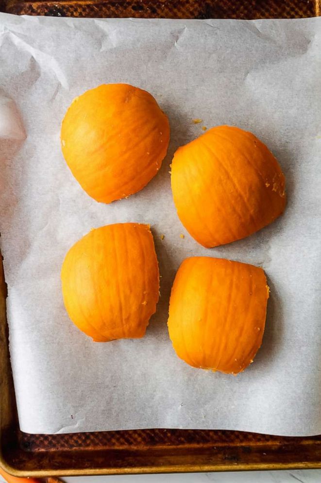 PHOTO: Place the four pieces flesh down on a baking sheet lined with parchment paper, and roast for 20 to 25 minutes.