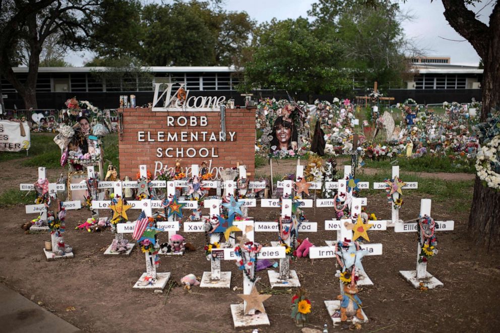 PHOTO: Crosses set up to honor those who lost their lives during the Robb Elementary School shooting in Uvalde, Texas on Nov. 8, 2022. 