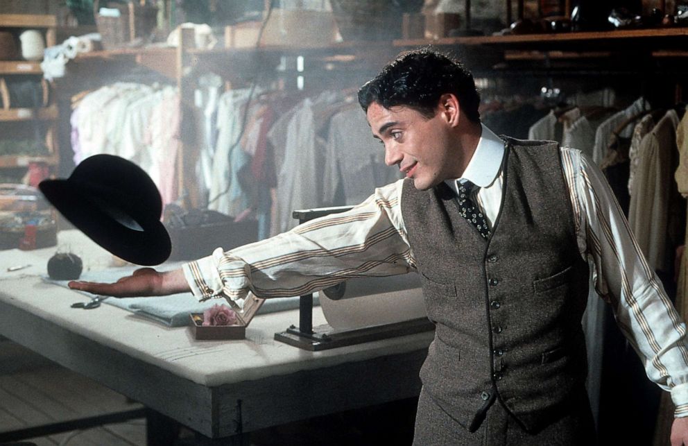 PHOTO: Robert Downey Jr playing around with his hat in a scene from the film "Chaplin."