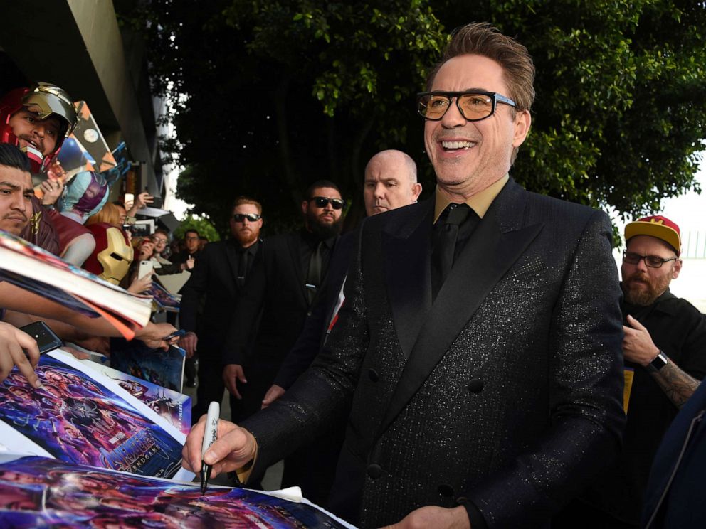 PHOTO: In this April 22, 2019, file photo Robert Downey Jr. signs autographs as he arrives at the premiere of Avengers: Endgame at the Los Angeles Convention Center.