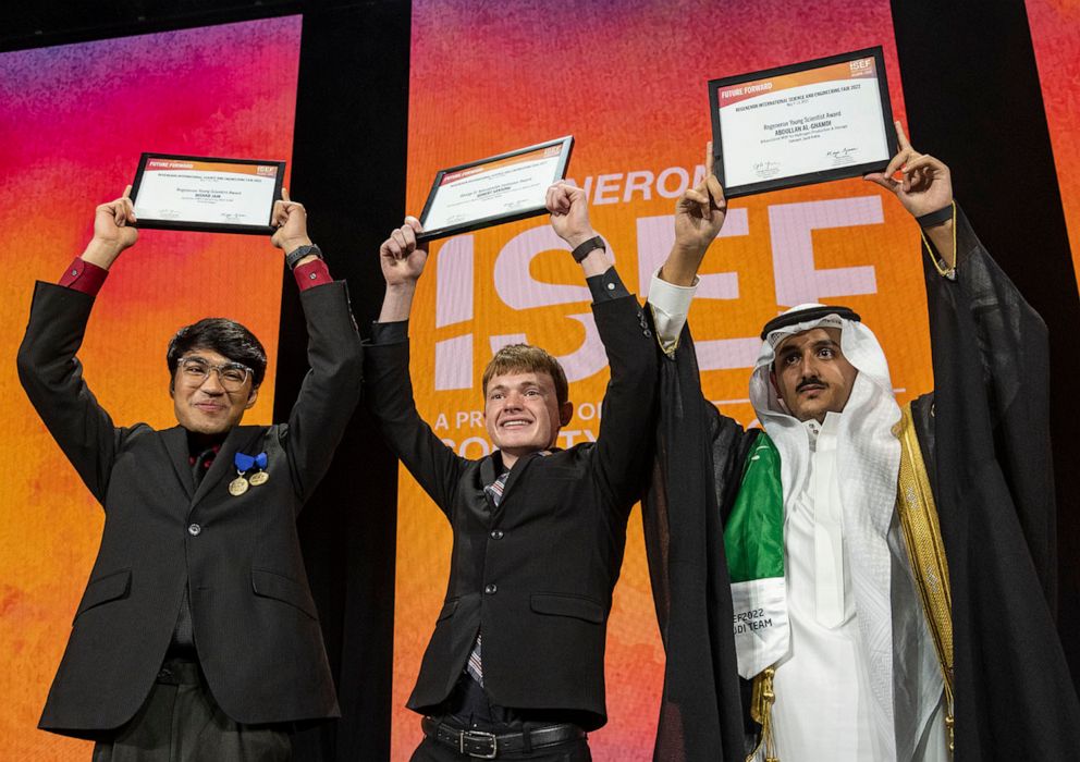 PHOTO: Robert Sansone, 17, of Fort Pierce, Florida (pictured in the middle) won first place at the 2022 Regeneron International Science and Engineering Fair for his research focused on moving toward sustainable manufacturing of electric vehicles.