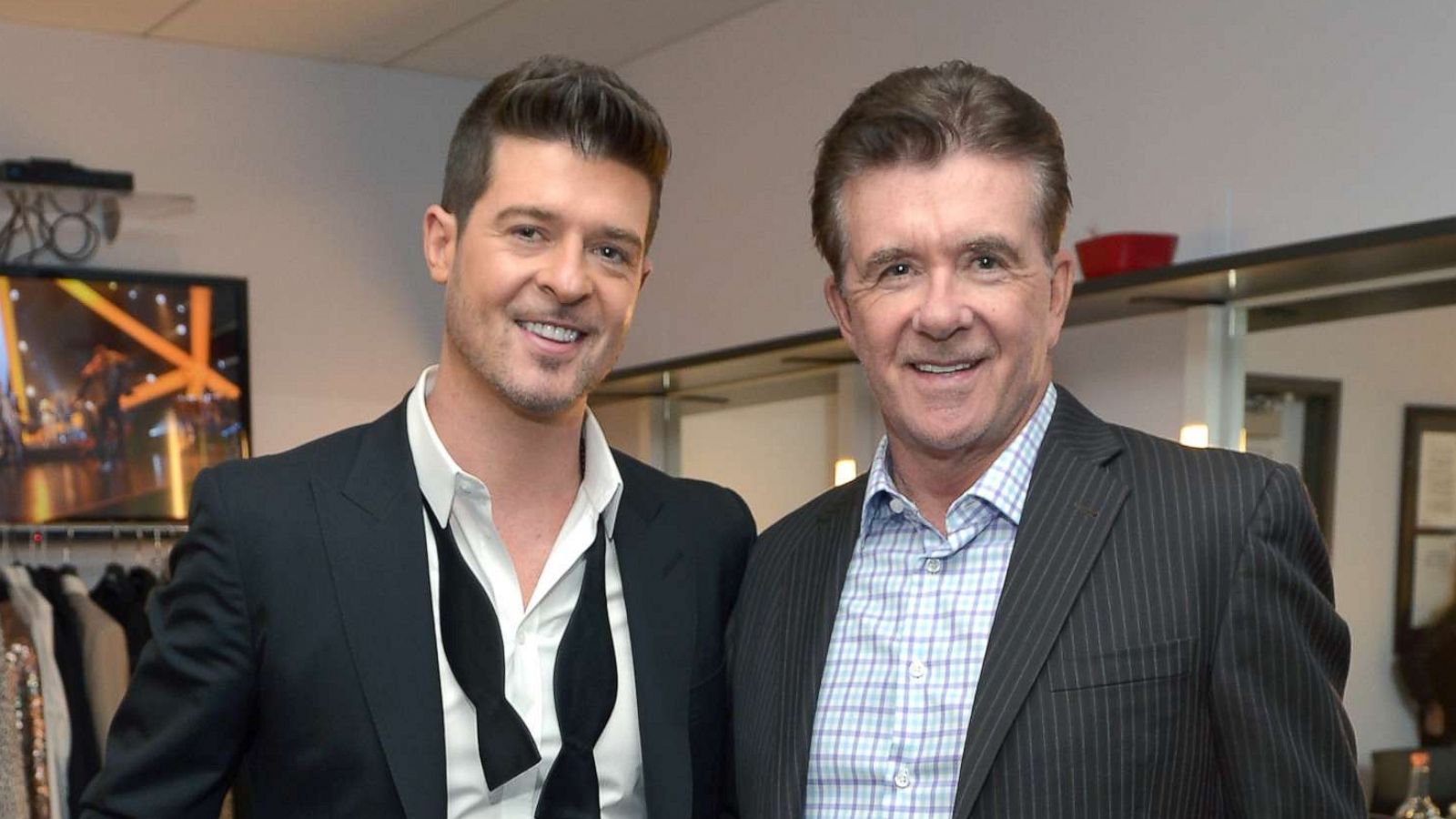 PHOTO: Recording artist Robin Thicke and his father, actor Alan Thicke, attend an event at Nokia Theatre L.A. Live on Dec. 6, 2013, in Los Angeles.