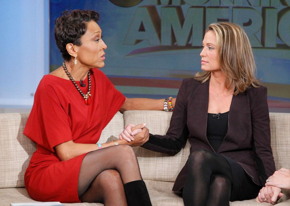 PHOTO: Amy Robach reveals her breast cancer diagnosis with Robin Robert's on "Good Morning America," Nov. 11, 2013.