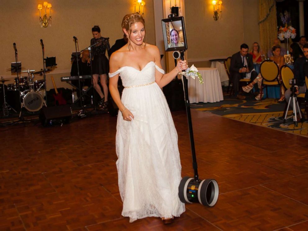PHOTO: Elizabeth Dubow, 34, attended her younger sister, Anna Halperin-Salmons, 31, wedding by way of robot on Aug. 11, 2018.