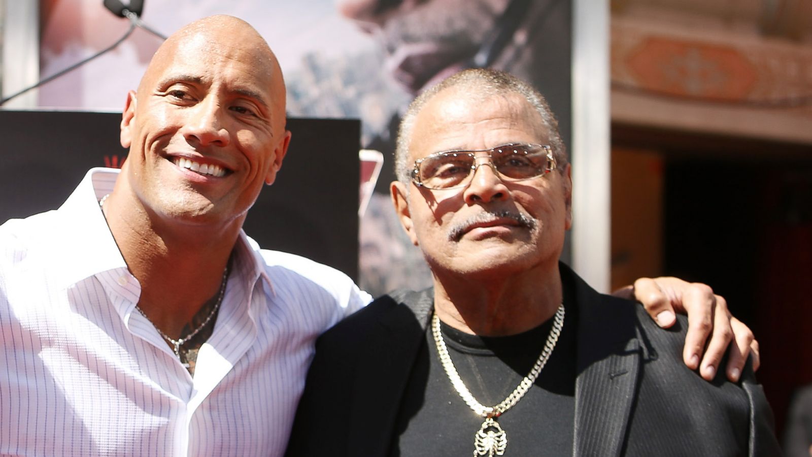 PHOTO: Dwayne "The Rock" Johnson his dad at the hand/footprint ceremony honoring him held at TCL Chinese Theatre IMAX in this May 19, 2015 file photo in Hollywood, Calif.