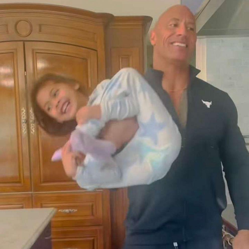Dwayne Johnson shares hilarious video doing 'daddy curls' with his daughter  - Good Morning America