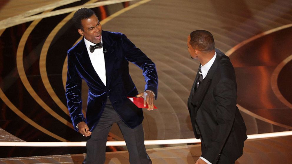 PHOTO: Chris Rock reacts after being hit by Will Smith during the 94th Academy Awards in Hollywood, Calif., March 27, 2022.