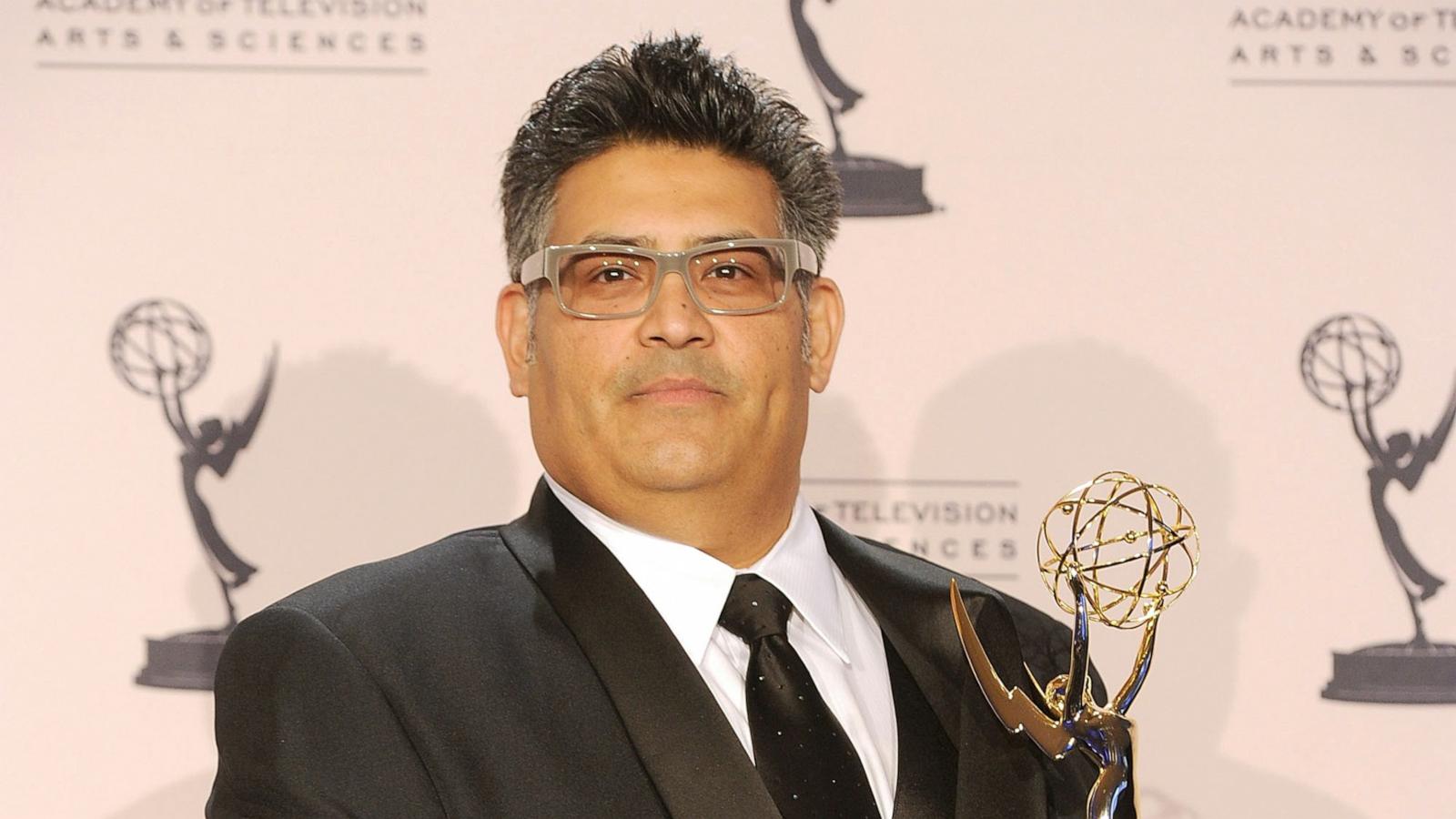 PHOTO: Costume designer Rodney Munoz poses with an Emmy Award for Outstanding Costumes for a Variety/Music Program or a Special (juried award) for "Jimmy Kimmel Live" in press room during the 62nd Primetime Creative Arts Emmy Awards in Los Angeles.