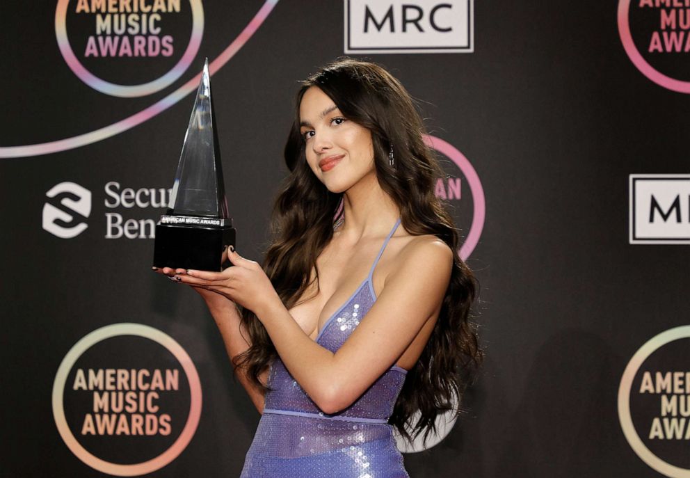 PHOTO: Olivia Rodrigo, winner of the New Artist Of The Year award, poses in the Press Room at the 2021 American Music Awards at Microsoft Theater on Nov. 21, 2021, in Los Angeles, Calif.