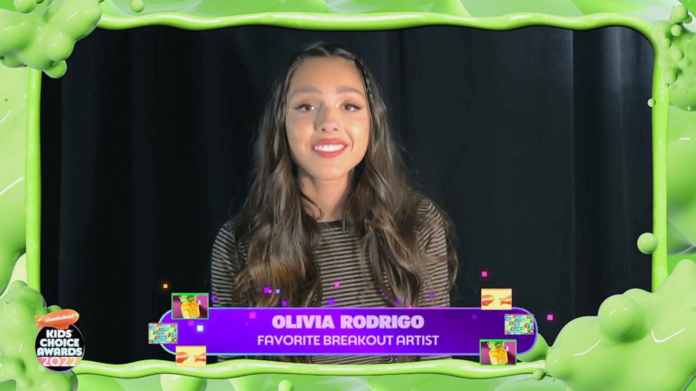 PHOTO: Olivia Rodrigo accepts the Favorite Breakout Artist Award during the Nickelodeon's Kids' Choice Awards 2022 at Barker Hangar on April 09, 2022, in Santa Monica, Calif.
