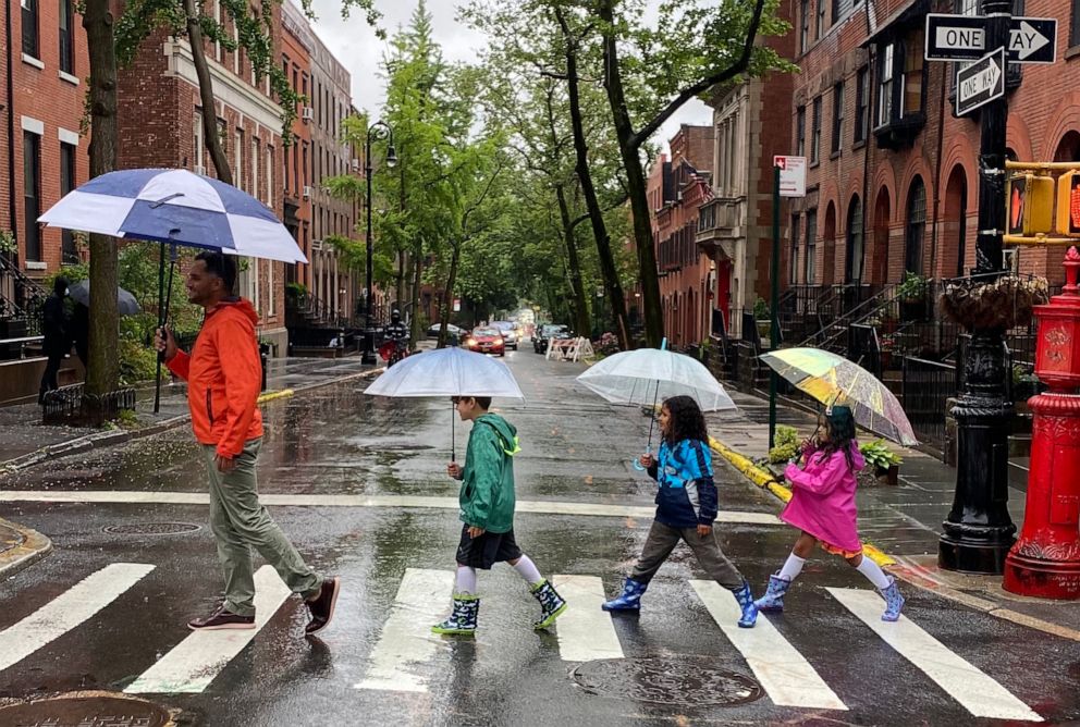 PHOTO: Jose Rolon, 45, from Brooklyn, New York, with his children Avery, Lilah, and London.