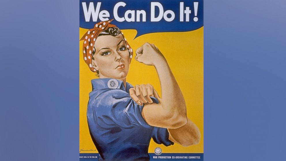 PHOTO: WWII patriotic We Can Do It poster by J. Howard Miller featuring a woman factory worker in bandana rolling up her sleeve & flexing her arm muscles. 