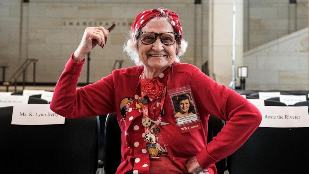 PHOTO: Sylvia "Delsi" Tanis, 98 years old, an original member of the "Rosies" poses for a portrait prior to a Congressional Gold Medal Ceremony in Emancipation Hall of the U.S. Capitol in Washington, U.S., April 10, 2024. 