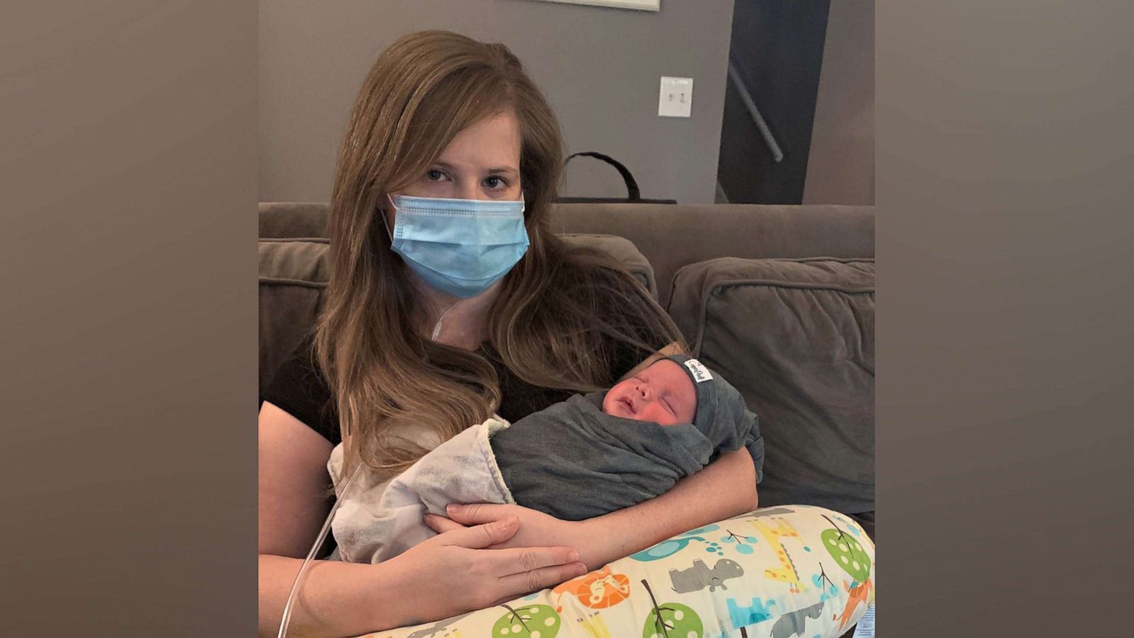 PHOTO: Jessica Rowlett holds her newborn son Rowdy after spending over one month in the hospital battling COVID-19.