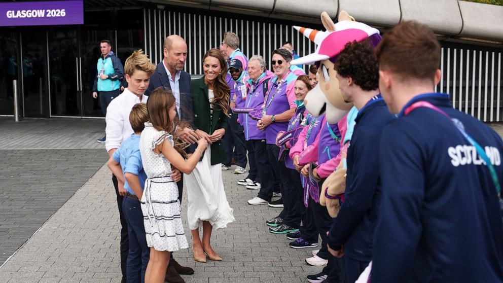 PHOTO: Britain's William, Prince of Wales, Catherine, Princess of Wales, Princess Charlotte, Prince George and Prince Louis with volunteers and athletes outside the arena of the Commonwealth Games 2026 on Aug 1, 2026, in Glasgow, Scotland.