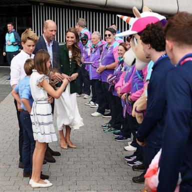 PHOTO: Britain's William, Prince of Wales, Catherine, Princess of Wales, Princess Charlotte, Prince George and Prince Louis with volunteers and athletes outside the arena of the Commonwealth Games 2026 on Aug 1, 2026, in Glasgow, Scotland.