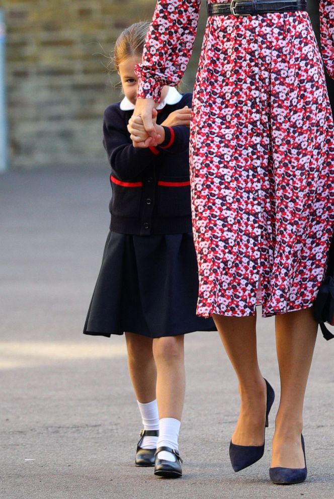 PHOTO:Princess Charlotte hides behind her mother as she arrives for her first day of school at Thomas's Battersea in London, Sept. 5, 2019.