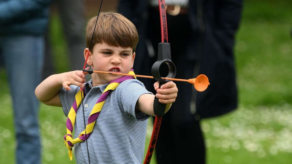 Prince Louis uses a shovel and tries archery during the first royal engagement