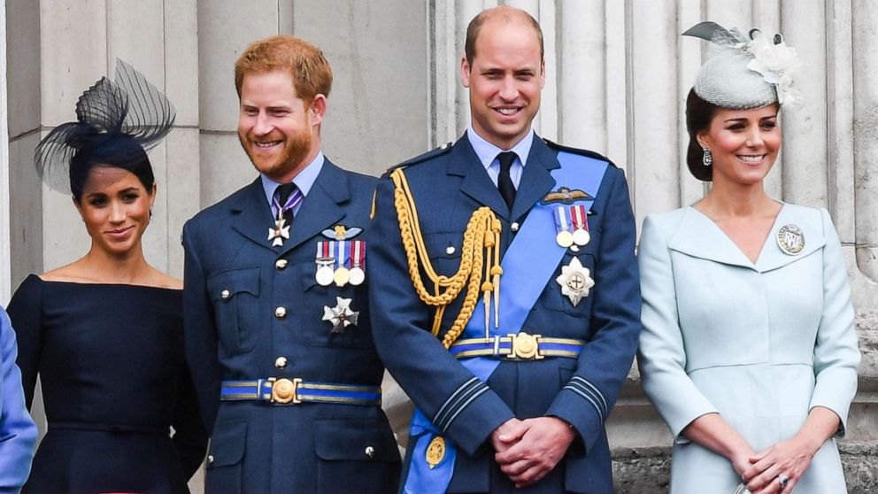 PHOTO: Meghan, Duchess of Sussex, Prince Harry, Duke of Sussex, Prince William, Duke of Cambridge and Catherine, Duchess of Cambridge stand on the balcony of Buckingham Palace, July 10, 2018 in London.