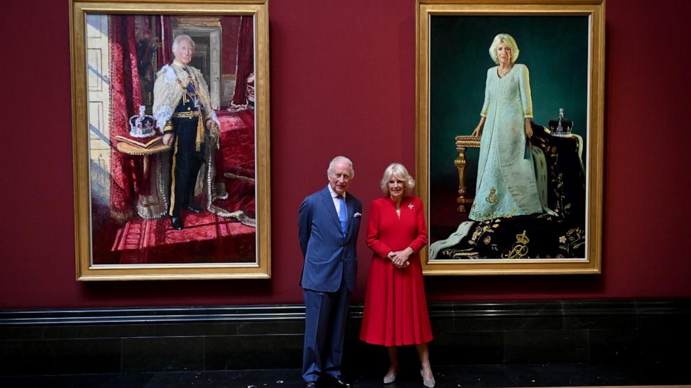 PHOTO: King Charles III and Queen Camilla pose with their official Coronation State Portraits during a visit to The National Gallery on May 06, 2025 in London, England.