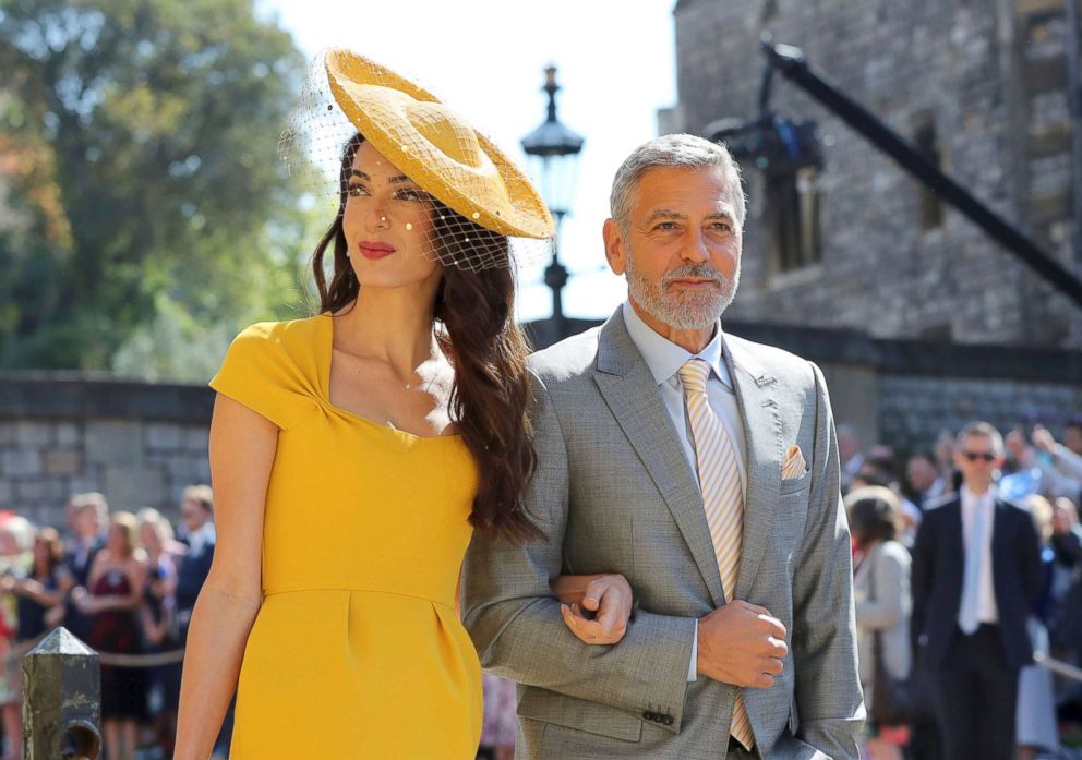 PHOTO: Amal Clooney and George Clooney arrive for the wedding ceremony of Prince Harry and Meghan Markle at St. George's Chapel in Windsor Castle in Windsor, May 19, 2018. 