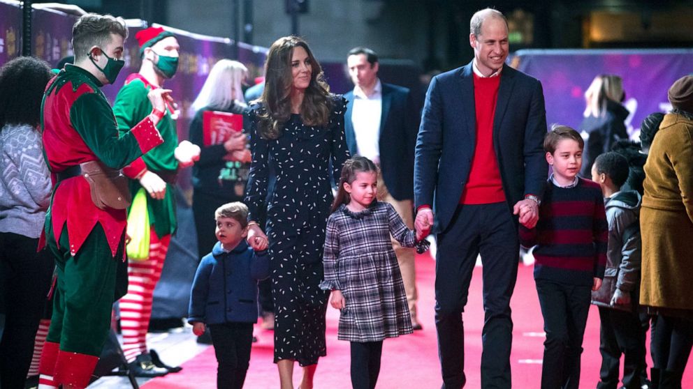 PHOTO: Prince William, Duke of Cambridge and Catherine, Duchess of Cambridge with their children, Prince Louis, Princess Charlotte and Prince George, attend a special pantomime performance at London's Palladium Theatre, Dec. 11, 2020, in London.
