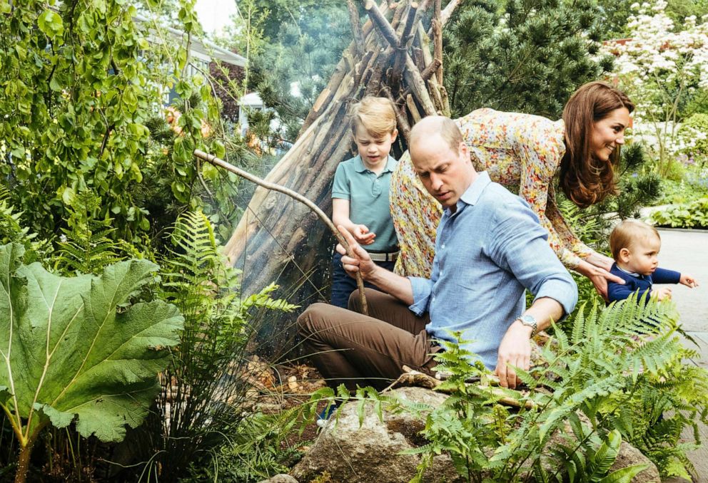 PHOTO: Prince William, Kate, Duchess of Cambridge and Prince George, Princess Charlotte and Prince Louis play in the Adam White and Andree Davies co-designed garden ahead of the RHS Chelsea Flower Show in London in this photo released, May 19, 2019.
