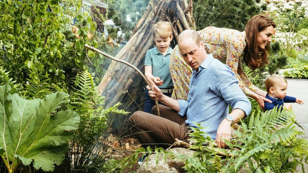 PHOTO:Prince William, Kate, Duchess of Cambridge and their children, Prince George, Princess Charlotte and Prince Louis play in the Adam White and Andree Davies co-designed garden in London in this photo released on May 19, 2019.