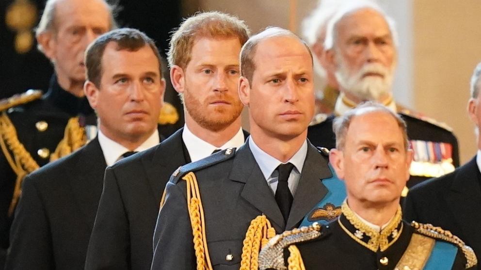 PHOTO: In this Sept. 14, 2022 file photo, (L-R) Peter Phillips, Prince Harry, Prince William and Edward, Earl of Wessex follow the bearer carrying the coffin of Queen Elizabeth II into Westminster Hall ahead of her funeral in London.