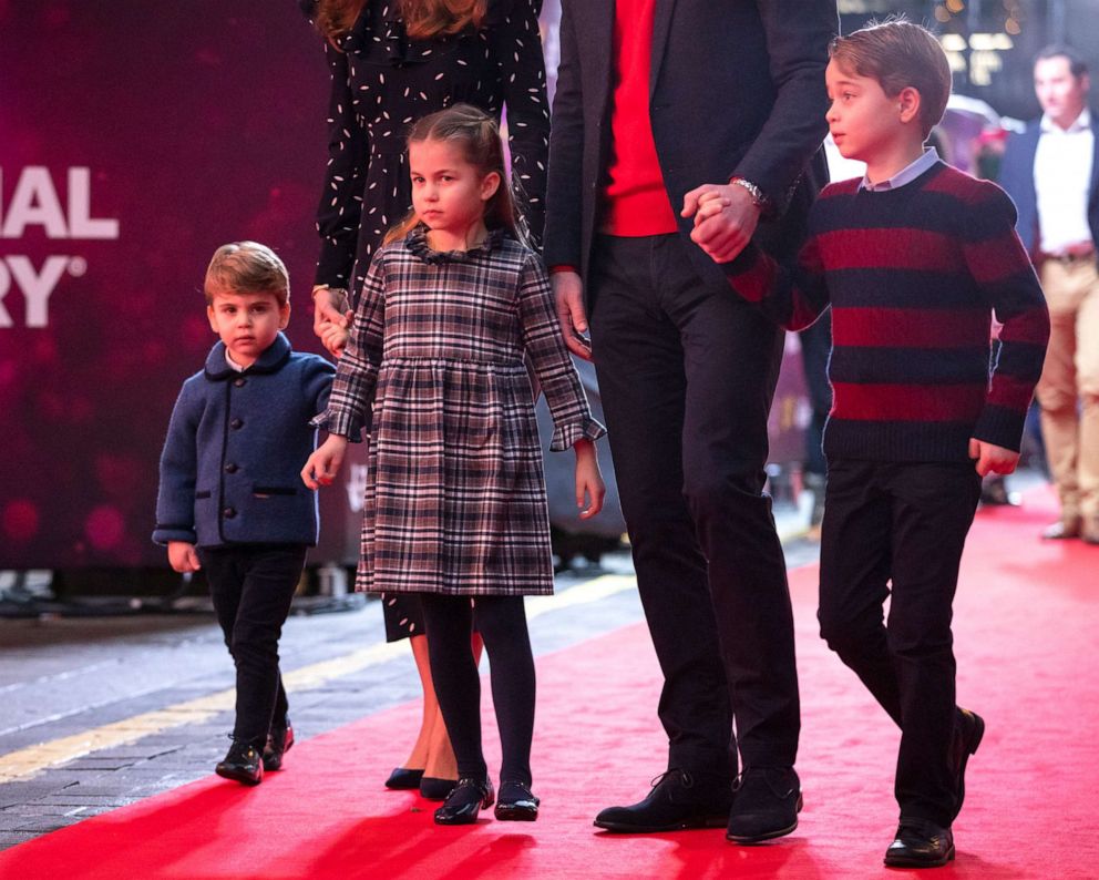 PHOTO: Prince William, Duke of Cambridge and Catherine, Duchess of Cambridge with their children, Prince Louis, Princess Charlotte and Prince George, attend a special pantomime performance at London's Palladium Theatre, Dec. 11, 2020, in London.