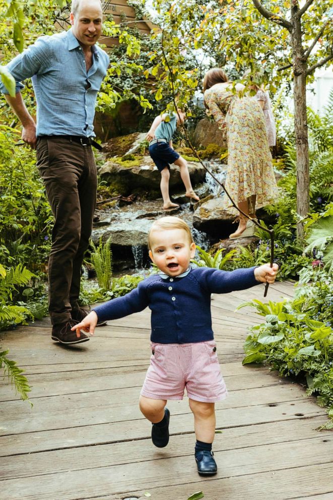 PHOTO: Prince William, Kate, Duchess of Cambridge and their children, Prince George, Princess Charlotte and Prince Louis play in the Adam White and Andree Davies co-designed garden ahead, in this image released on, May 19, 2019.