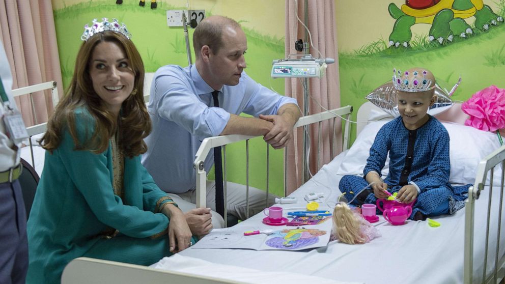 PHOTO: The Duke and Duchess of Cambridge with seven-year-old cancer patient Wafia Remain, during a visit to Shaukat Khanum Memorial Cancer Hospital and Research Centre in Lahore, Pakistan, Oct. 17, 2019, on the fourth day of the royal visit to Pakistan.