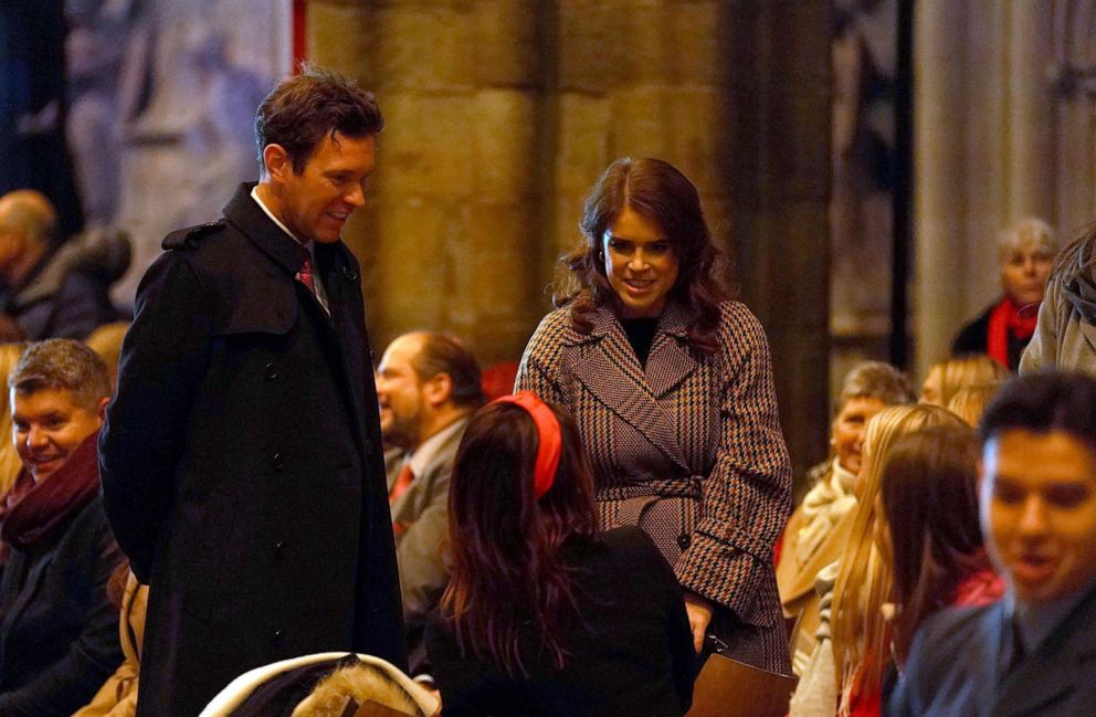 PHOTO: Britain's Princess Eugenie of York and her husband Jack Brooksbank arrive to attend the 'Together at Christmas' carol service at Westminster Abbey, Dec. 15, 2022 in London.