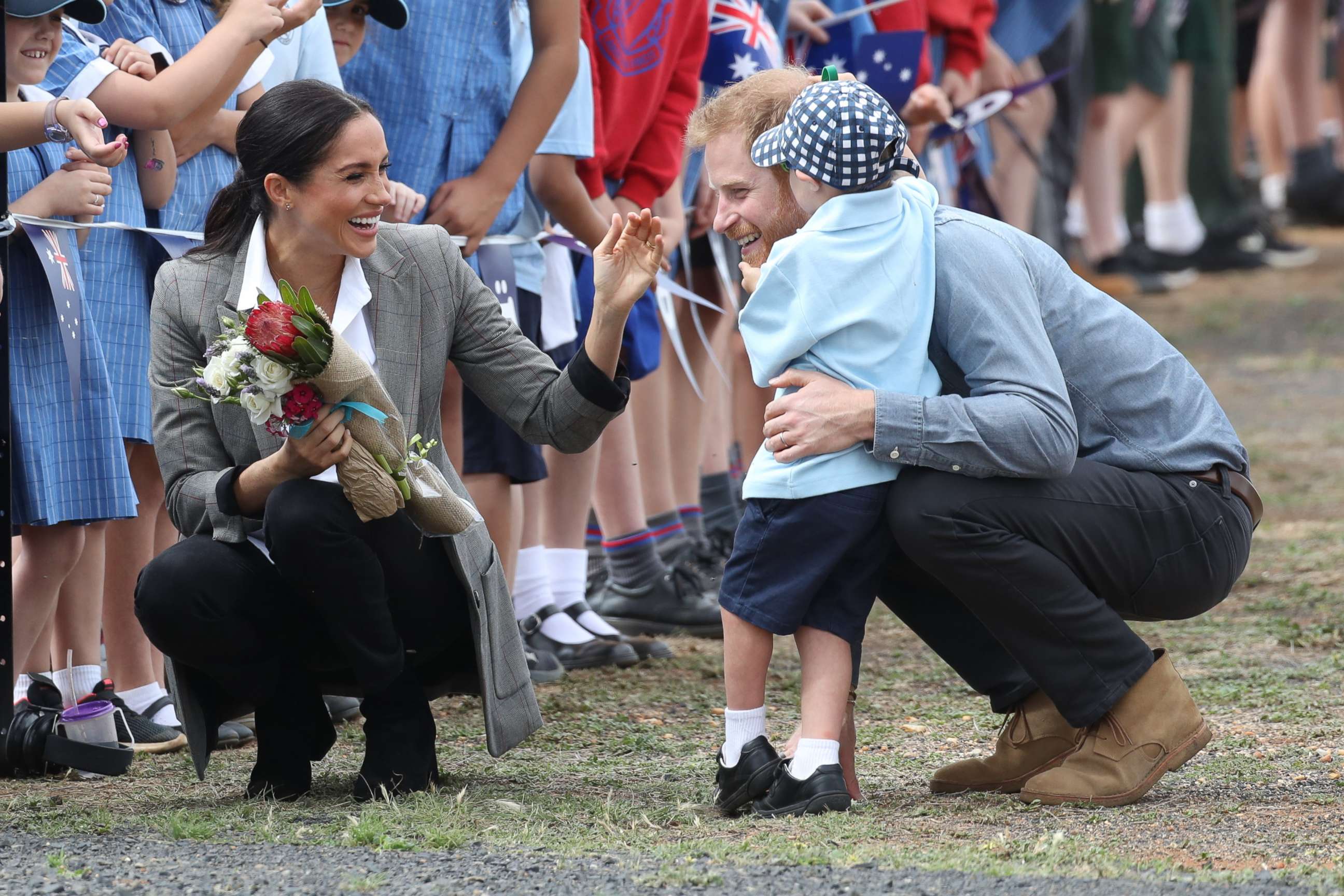 PHOTO: Prince Harry and Meghan Markle, The Duke and Duchess of Sussex, arrive at Dubbo Airport, Australia, for a naming dedication for a new aircraft at the Royal Flying Doctor Service based at the airport, on day two of their Royal Tour.