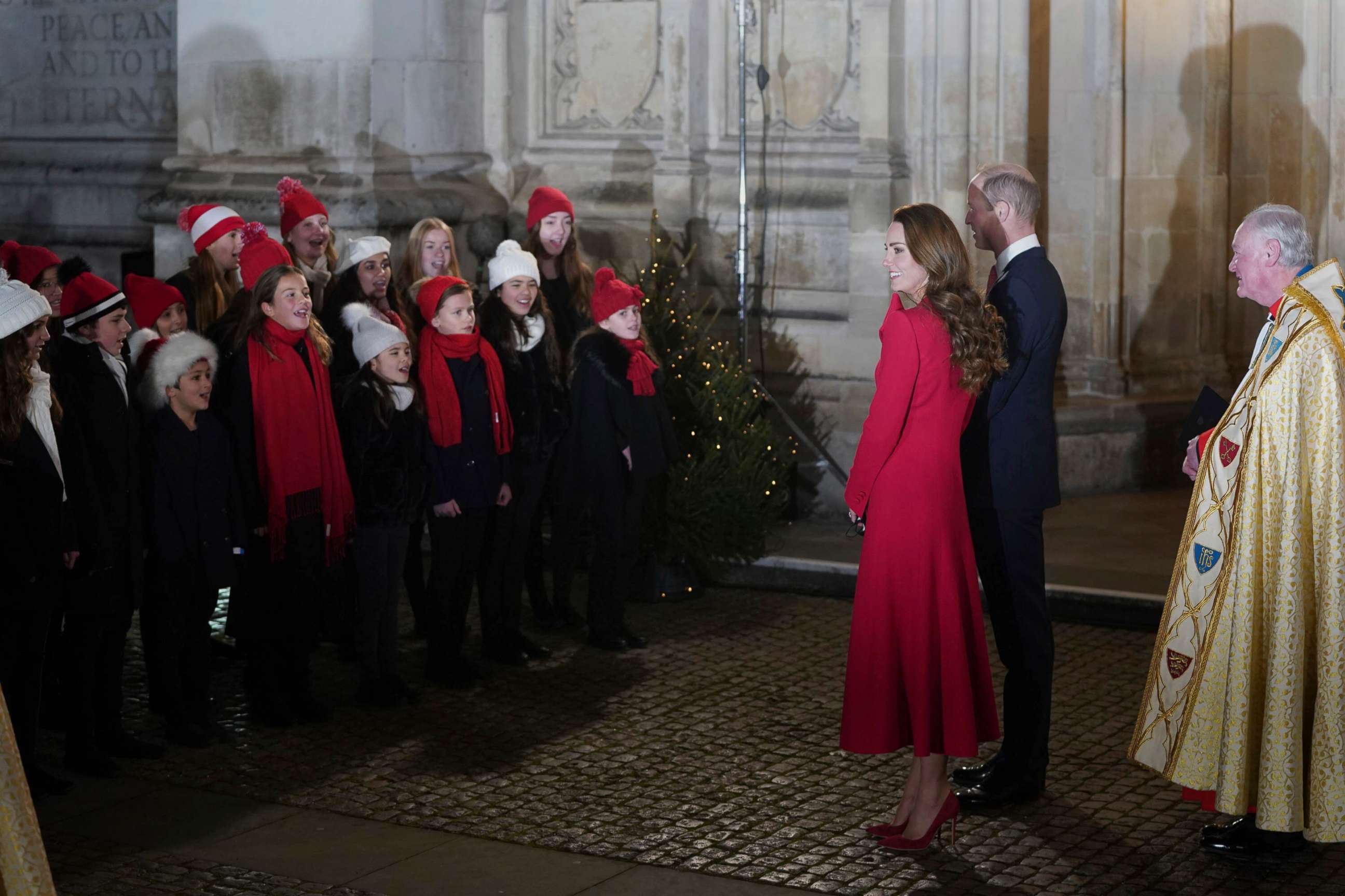 PHOTO: Britain's Prince William and Kate, Duchess of Cambridge meet children as they depart the Christmas carol service at Westminster Abbey in London, Dec. 8, 2021. 
