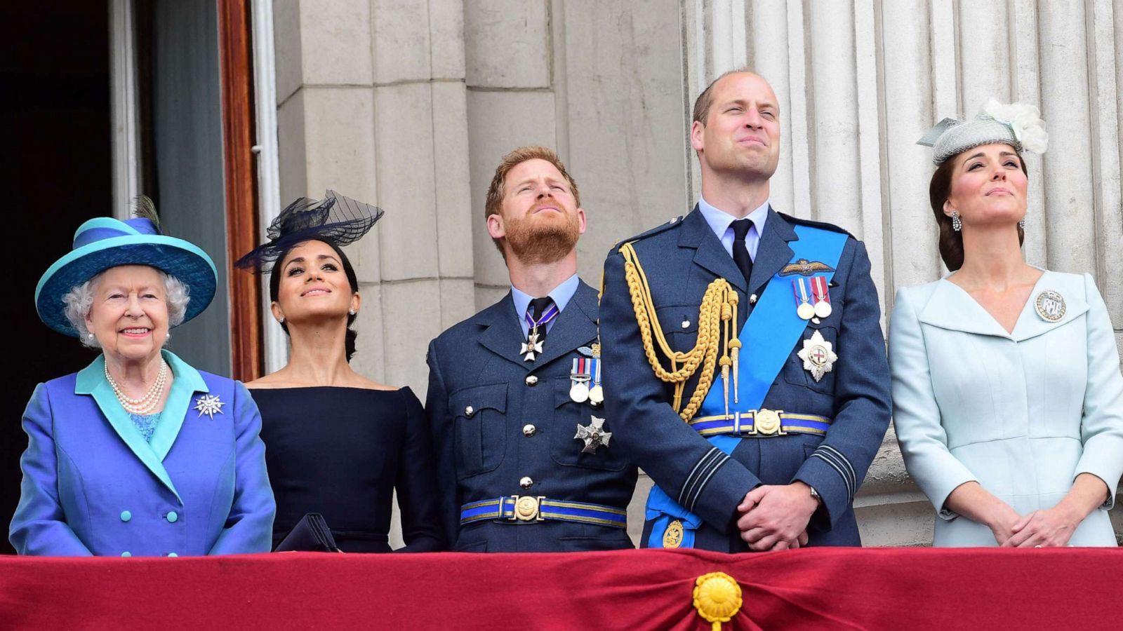 PHOTO: The Royal family watches a military fly-past to mark the centenary of the Royal Air Force (RAF), on the balcony of Buckingham Palace, July 10, 2018.