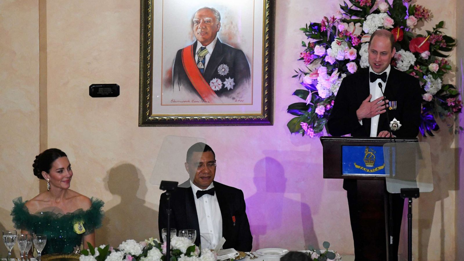 PHOTO: Jamaica's Prime Minister Andrew Holness and Catherine, Duchess of Cambridge, listen as Britain's Prince William delivers a speech in Kingston, Jamaica, March 23, 2022.