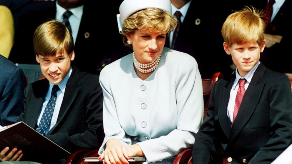 PHOTO: Princess Diana, Princess of Wales with her sons Prince William and Prince Harry attend the Heads of State VE Remembrance Service in Hyde Park on May 7, 1995 in London. 